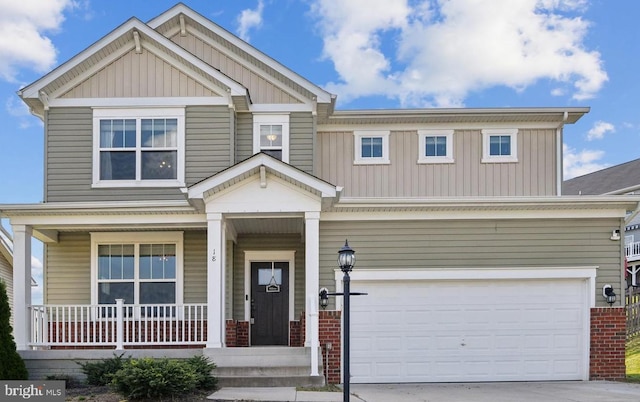 craftsman house with a garage and a porch