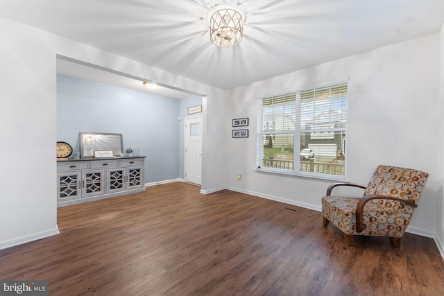 living area with dark wood-type flooring