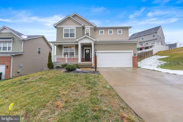 view of front of home featuring a front yard, a garage, and a porch