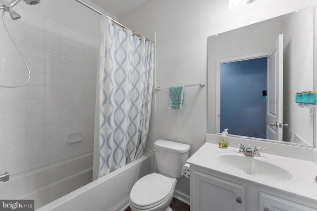 full bathroom with toilet, vanity, and shower / bath combo