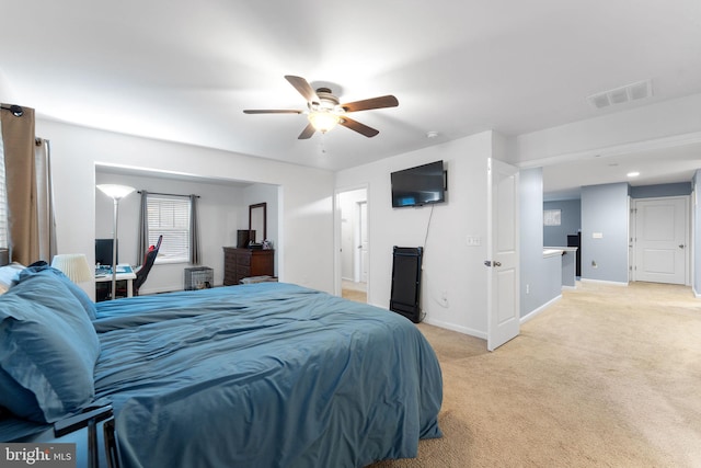 carpeted bedroom with ceiling fan