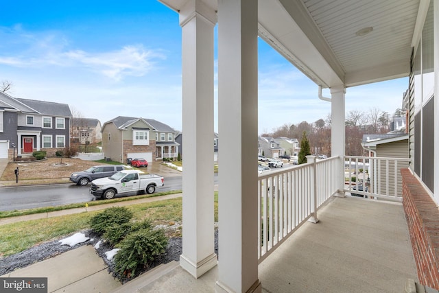 balcony featuring a porch