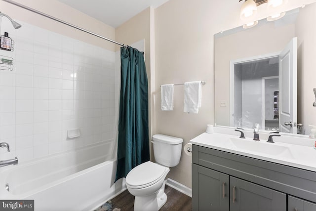 full bathroom with toilet, shower / bath combo, hardwood / wood-style flooring, and vanity