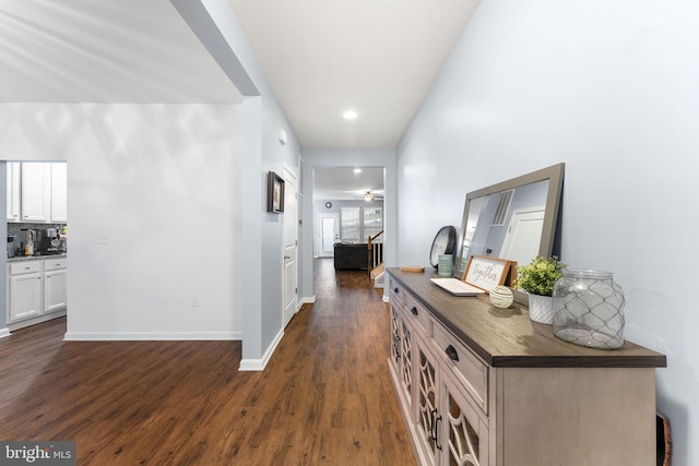 hallway featuring dark wood-type flooring