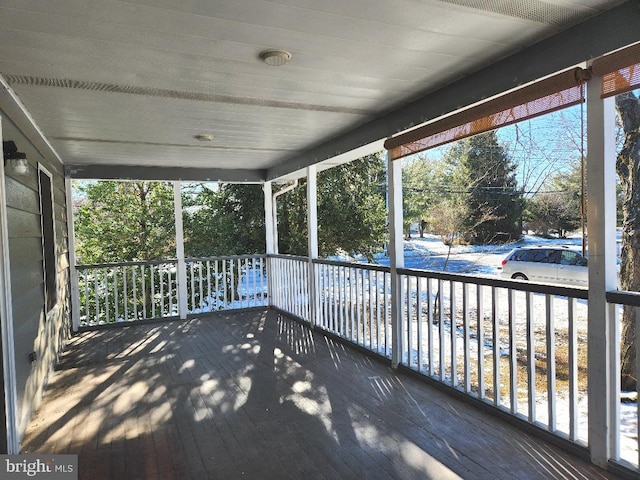 wooden deck featuring a porch