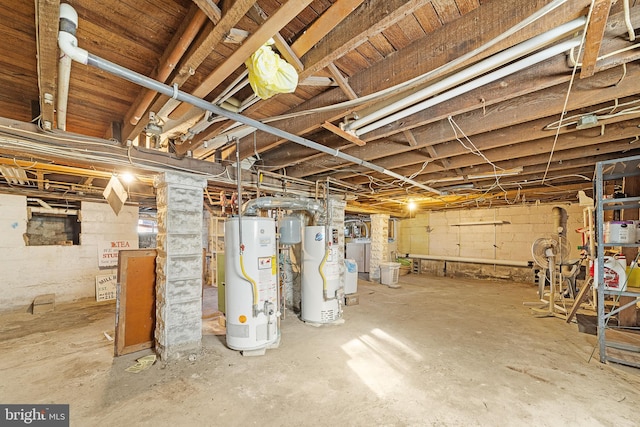 basement with gas water heater and washer / dryer