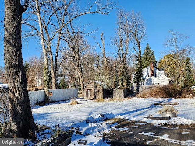 view of yard covered in snow