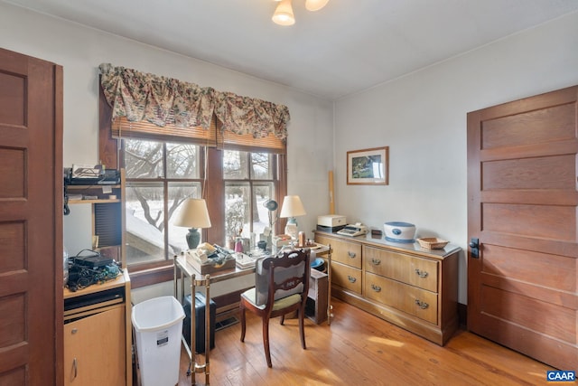 office space with light hardwood / wood-style floors