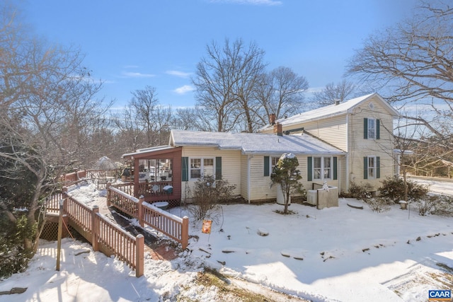 view of front of property featuring a wooden deck