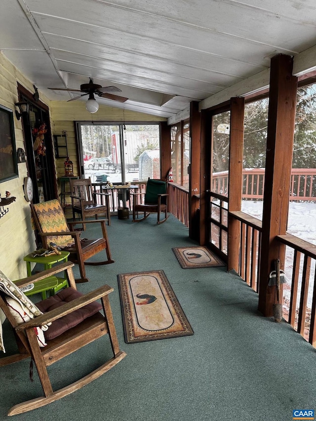 sunroom / solarium with ceiling fan