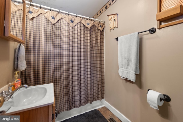 bathroom with tile patterned floors and sink