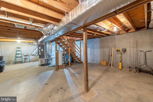 basement with heating unit and water heater