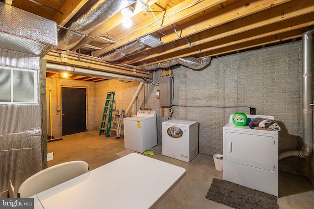 basement with washer and dryer and refrigerator