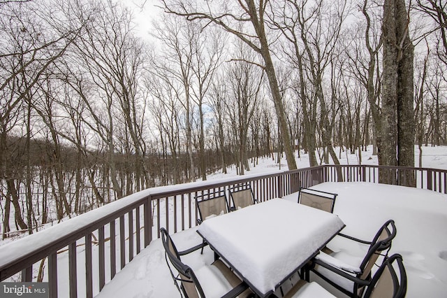 view of snow covered deck