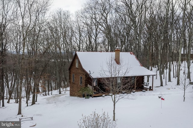 view of snow covered property