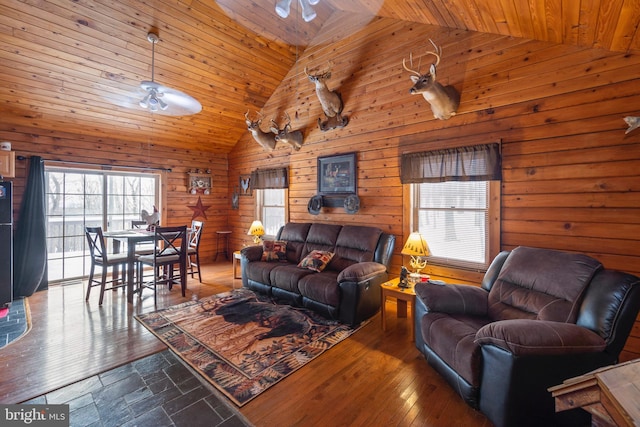 living room featuring high vaulted ceiling, ceiling fan, wooden ceiling, and a wealth of natural light