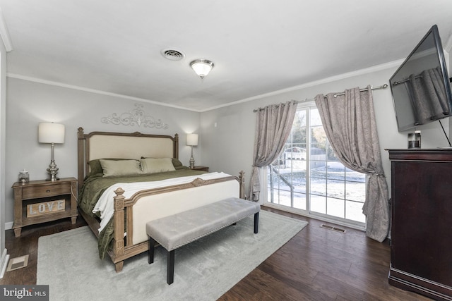 bedroom with access to outside, dark wood-type flooring, and ornamental molding