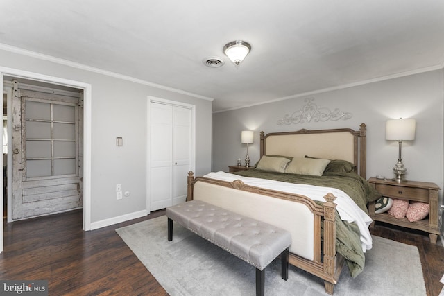 bedroom featuring crown molding and dark wood-type flooring