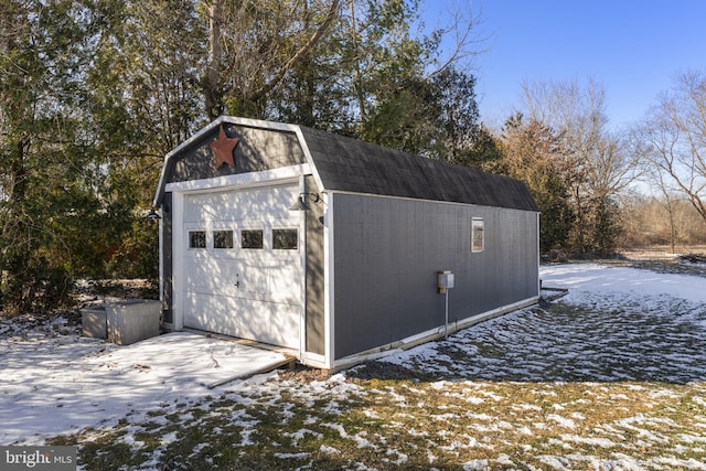 view of snow covered garage