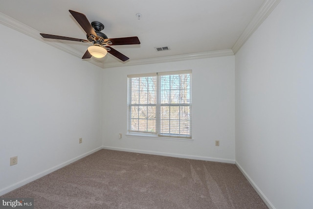 carpeted empty room featuring ceiling fan and ornamental molding