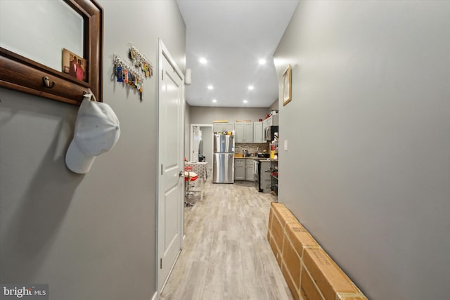 hall featuring light hardwood / wood-style floors