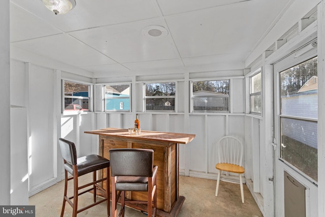 sunroom featuring a healthy amount of sunlight