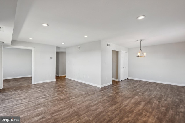 empty room featuring dark hardwood / wood-style floors