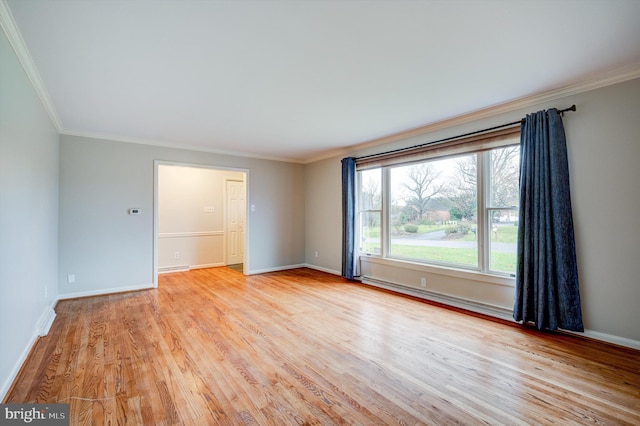 unfurnished room featuring light hardwood / wood-style floors and ornamental molding