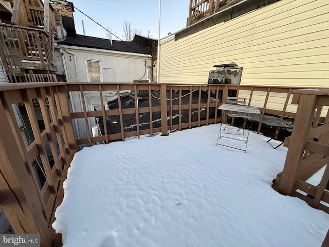 view of snow covered deck