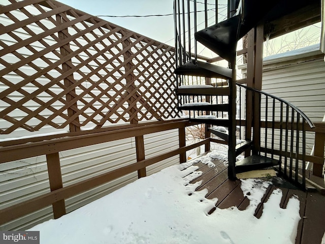 view of snow covered deck