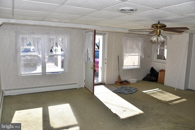 entryway with carpet, ceiling fan, a paneled ceiling, and baseboard heating