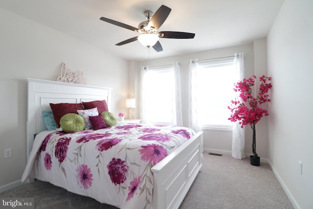 carpeted bedroom featuring ceiling fan