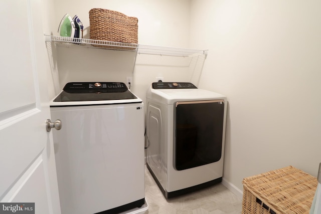 laundry area featuring washer and clothes dryer