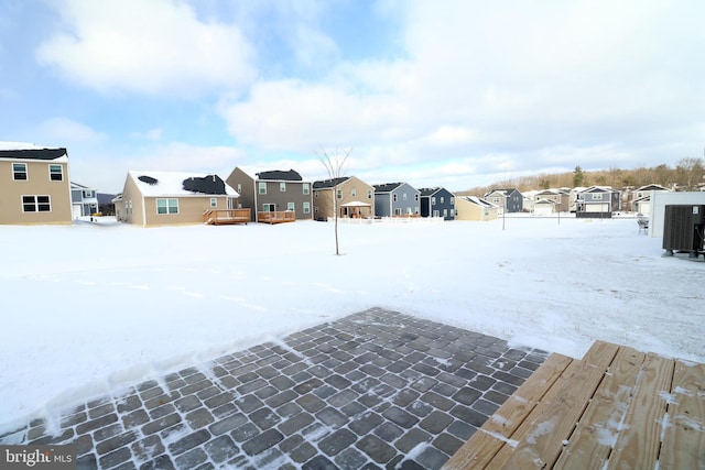 view of yard covered in snow