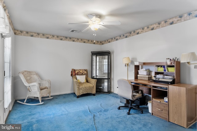 office area with ceiling fan and carpet flooring