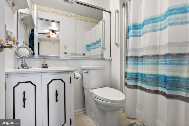 bathroom with vanity, ceiling fan, and toilet