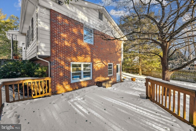 view of snow covered deck