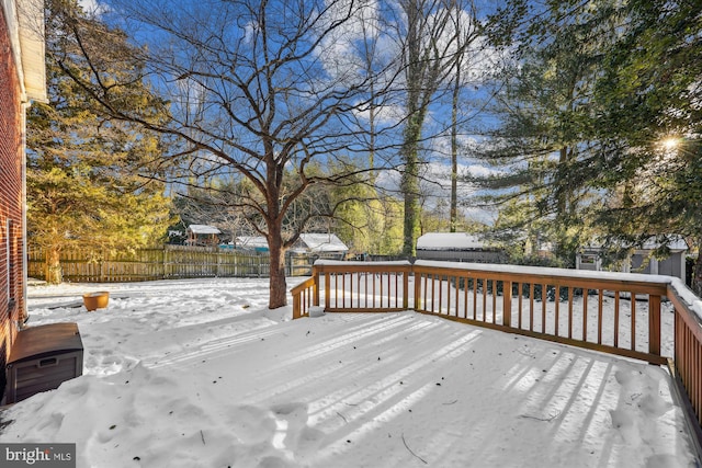 view of snow covered deck