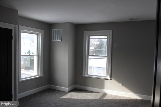 view of carpeted spare room