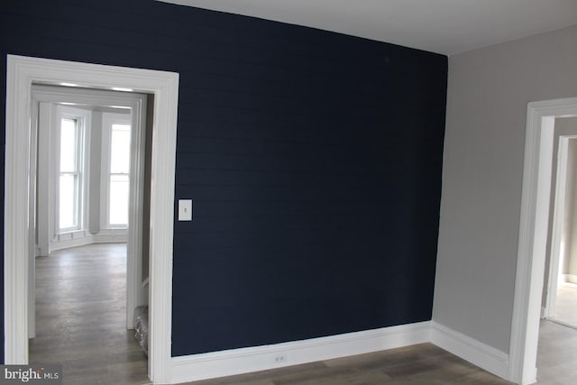 spare room featuring hardwood / wood-style flooring