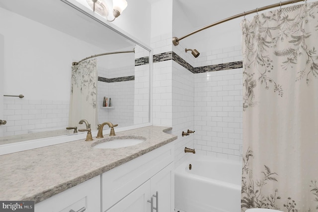 full bath featuring shower / bath combo with shower curtain and vanity