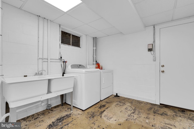 laundry area with washing machine and dryer
