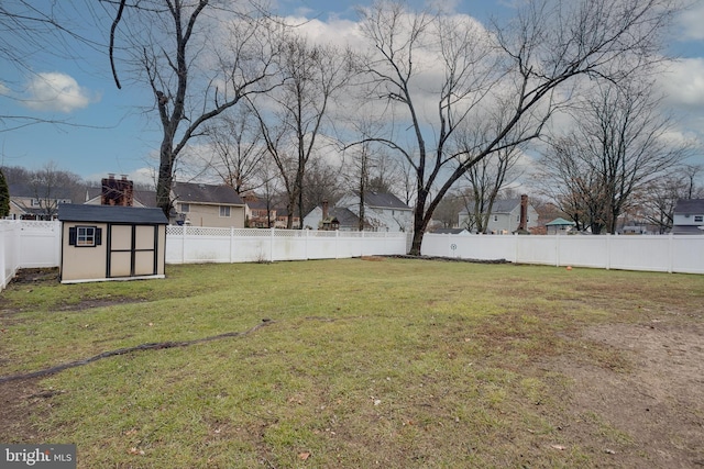 view of yard with a storage shed