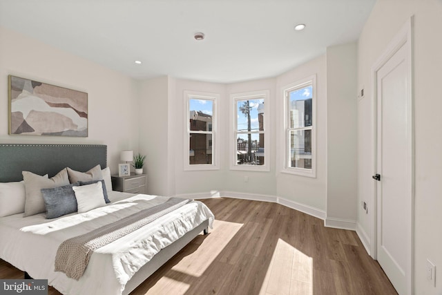 bedroom featuring hardwood / wood-style flooring