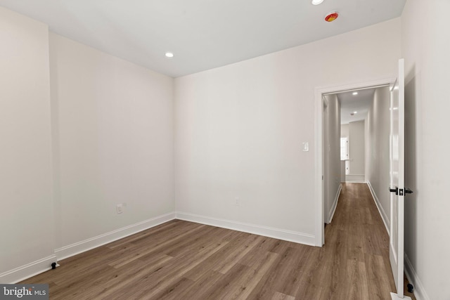 empty room featuring hardwood / wood-style floors