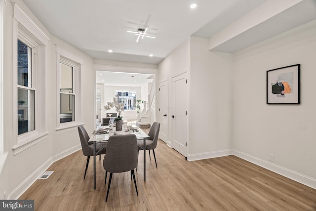 dining room featuring light hardwood / wood-style flooring