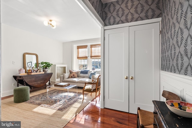 sitting room with hardwood / wood-style floors