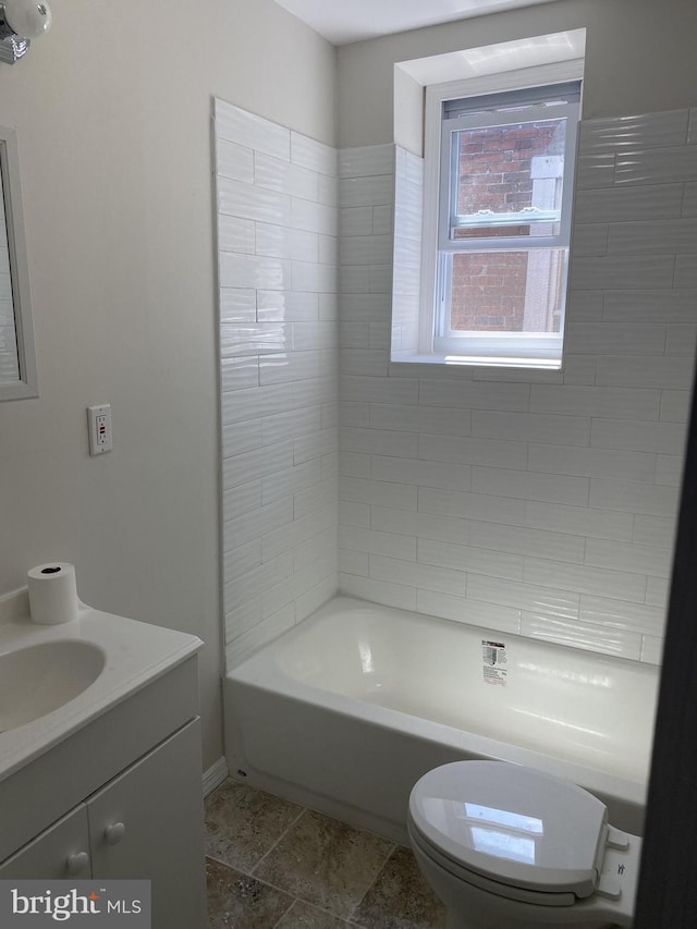 full bathroom featuring vanity, shower / bath combination, and toilet