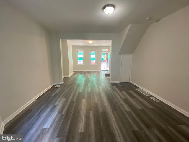 interior space with dark hardwood / wood-style flooring