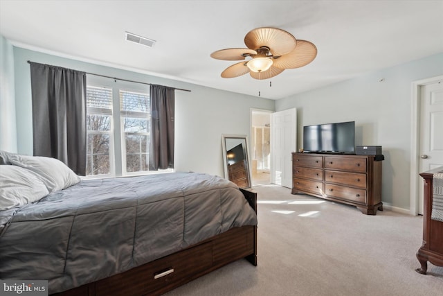 bedroom featuring baseboards, visible vents, ceiling fan, and carpet flooring